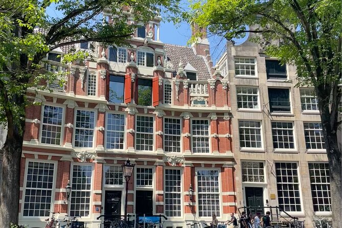 Private Walking Tour of Amsterdam - de Wallen (red light district) at street level: stories beyond the windows