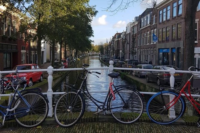 privatetour Delft, The Hague&Rotterdam Kinderdijk from Amsterdam - Hotel New York and Koninginnenhoofd: a quick Maas River pause