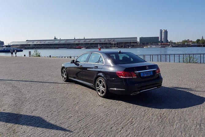 Schiphol Airport Private Transfer to Amsterdam with Meet & Greet - Bottled Water, Onboard Wi-Fi, and the Comfort of a Direct Ride