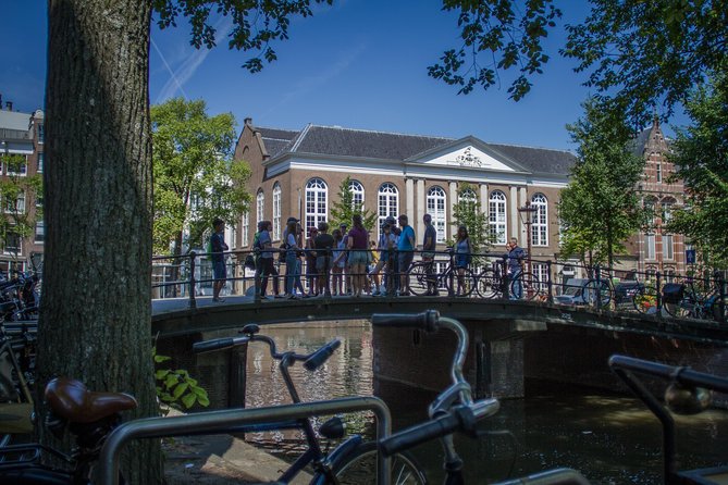 Secrets of Amsterdam Walking Tour plus Dutch Sweets Tasting - Dam Square and the Royal Palace/New Church: your history anchor