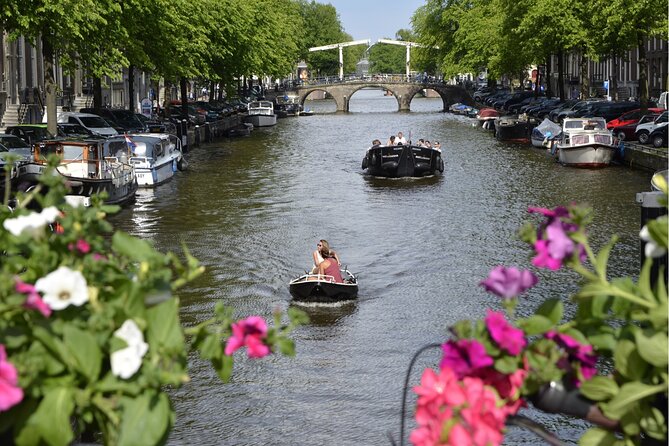 Self-guided city walking tour in Amsterdam - Getting started: mobile ticket, WhatsApp link, and a charged phone