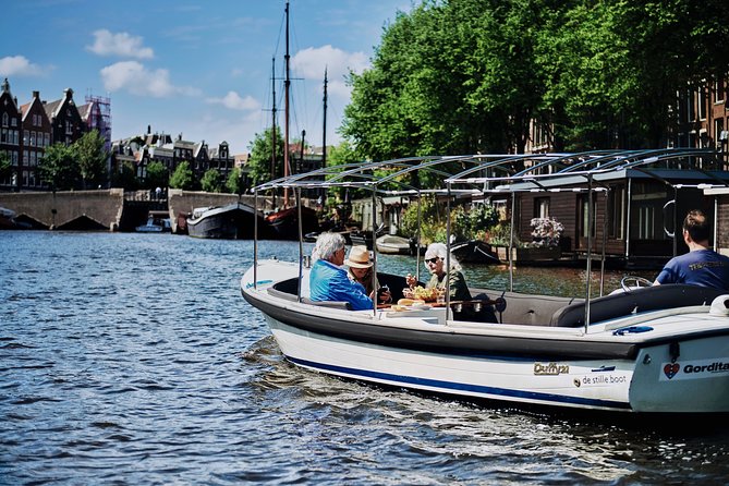 Short canal trip in German: Amsterdam in an hour - Meet Paap on Prinsengracht: Easy Start, No Fuss