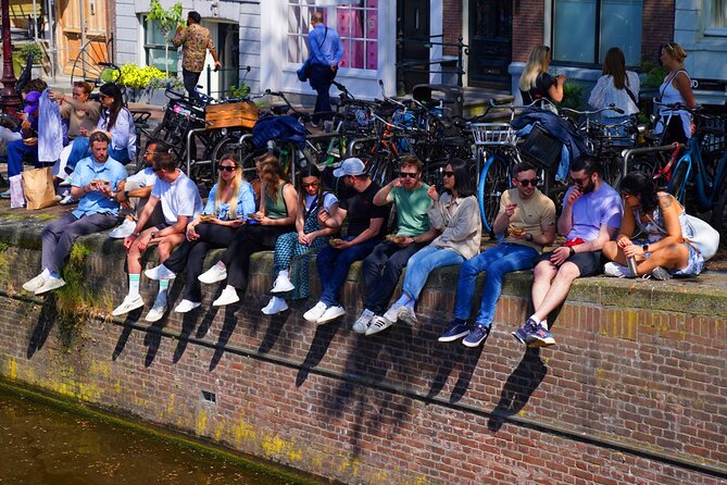Skipping Lines & Sipping Beers: A History Tour of Amsterdam - Canals and Quiet Corners After Your First Bite