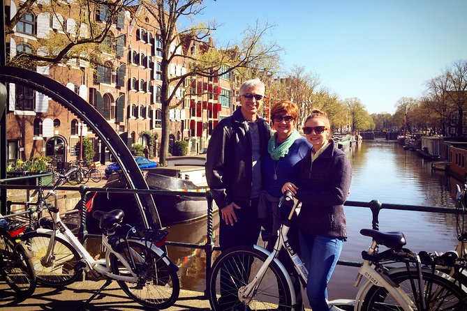 Small Group Guided Bike Tour of Amsterdam's Hidden Gems - Rijksmuseum viewpoint: museum-stopping without the ticket time