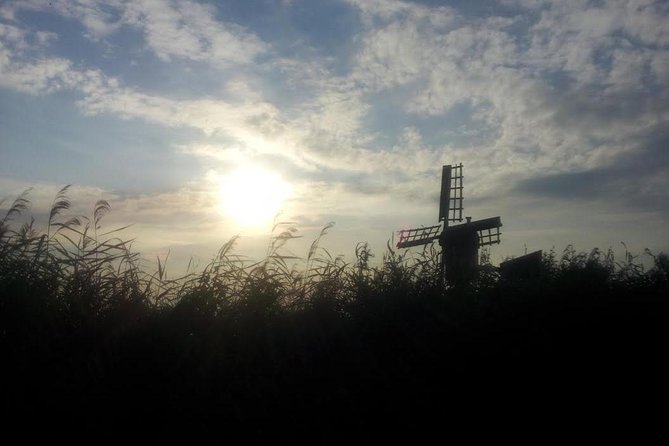 Small-Group Guided Sunset Canoe Tour in Waterland with Dinner - Getting on the canoe: easy waters, real hands-on time