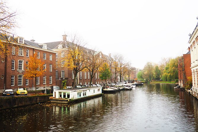 Small Group Hidden Gems Tour in Amsterdam - Stop 6: De Burcht and the labor-rights angle on Amsterdam diamonds