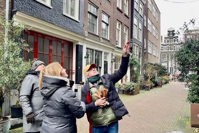Small Group Walking Tour in Amsterdam with Friendly and Fun Guide - Begijnhof: the quiet hofje courtyard with the 1607 English Reformed church