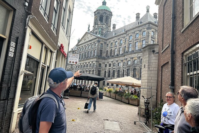 Small Group Walking Tour in Amsterdam with Friendly and Fun Guide - Nieuwe Kerk: a medieval checkpoint without the long detour