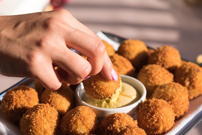 Top 10 Tastes of Amsterdam: Food & Culture Bike Tour - Haarlemmerdijk Herring and Cod Bites: The “Yes, This Is Amsterdam” Pair