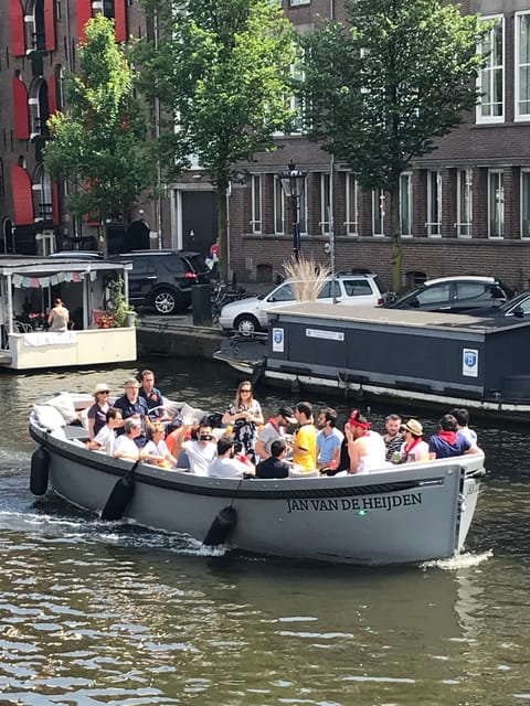 Visit Amsterdam by Boat with a French Guide (french) - Key highlights at a glance