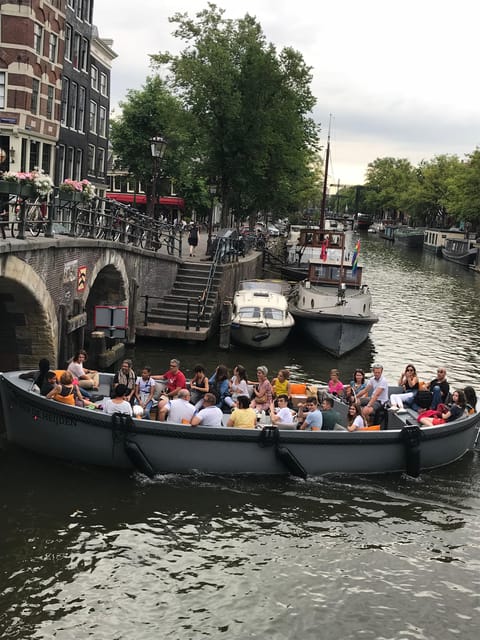 Visit Amsterdam by Boat with a French Guide (french) - Entrepotdok and the Return to Oosterdokskade 8