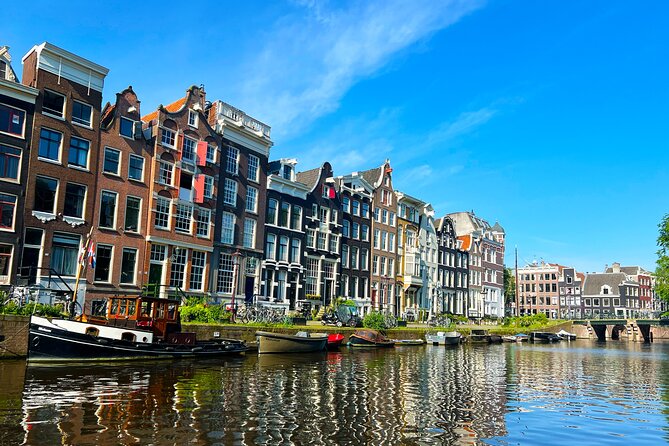 Walking Tour about Golden Age Architecture, private local guide - The Royal Palace: town hall roots and the clay problem