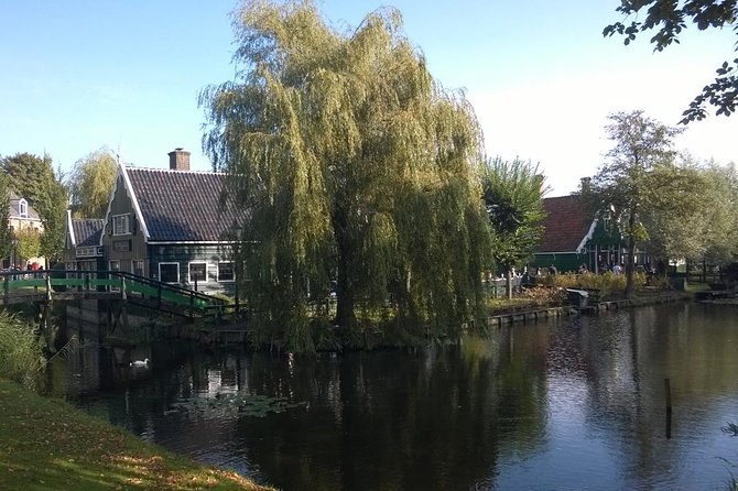 Zaanse Schans and Volendam Private Tour from Amsterdam - Volendam: the dike walk and a harbor view that feels like film