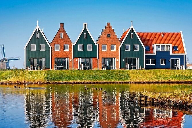 Zaanse Schans Edam Volendam Private Day Tour from Amsterdam - Volendam by the Water: Herring, Street Art, and a Smokehouse Dinner Stop